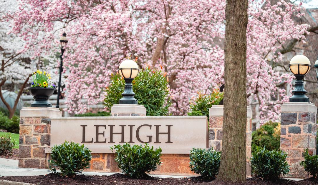 Lehigh sign in front of cherry blossoms
