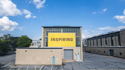 Inspiring sign on outside of Building C