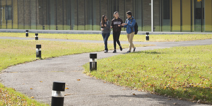 Students walking outside of Building C